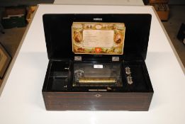 A late 19th Century Swiss cylinder music box, playing 8 airs in inlaid case