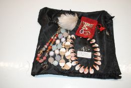A collection of jewellery to include conch shell n