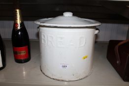 An enamel bread bin and cover