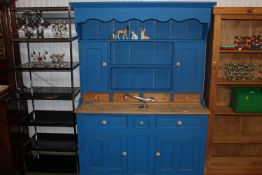 A painted pine dresser raised on cupboard base fit