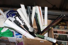 A box containing various rolled posters
