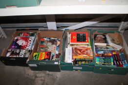 Four boxes containing various books and magazines
