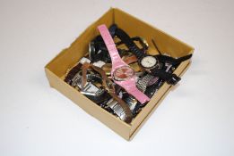 A box of various wrist watches
