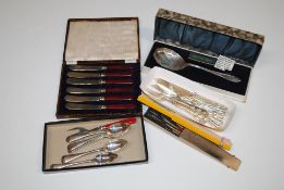 A box of various silver plated cutlery to include