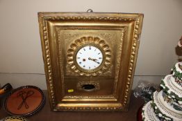 An antique gilt decorated wall clock AF