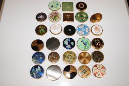 A box containing a large quantity of compacts