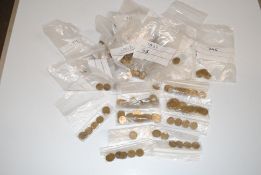 A box containing three pence pieces