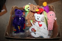 A box containing various Beanie Babies to include