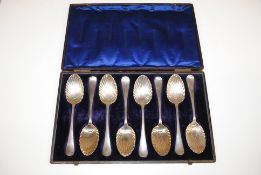 A cased set of eight silver plated spoons
