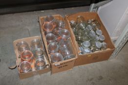 Three boxes containing various Kilner jars and gla