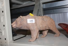 A Black Forest style ornament of a bear