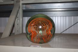A large glass paper weight (84)