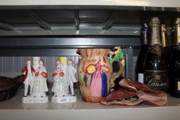 A Burleigh ware Nell Gwyn jug of King Charles II together with a pair of Staffordshire style figures