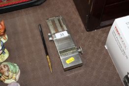 A vintage metal Comptator