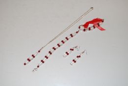 A 925 silver red coral and clear quartz necklace,
