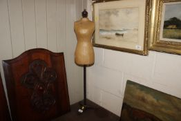A vintage child's tailors dummy