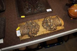 A gilt floral decorated expanding bookrack