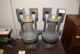 A pair of heavy gilded metal twin handled urn lamp