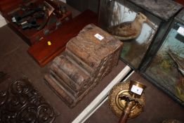 An antique carved corbel