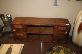 A bank of spice drawers