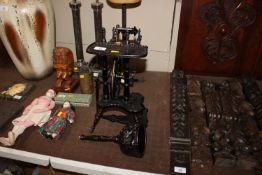 A vintage miniature spinning wheel