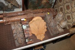 Four various antique carved corbels and a carved s