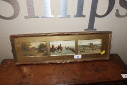 A small shallow gilt frame enclosing three photogr