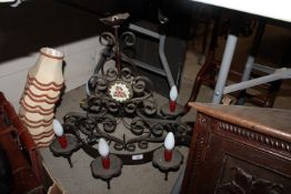 A metalware six light chandelier and shades
