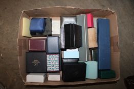 A box containing various jewellery boxes