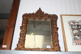 A gilt framed and bevel edged wall mirror