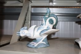 A Rye pottery ornament by David Sharp of a bird