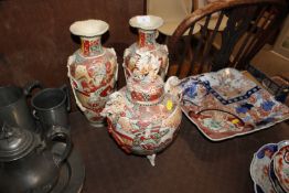A pair of Oriental Satsuma style vases with charac