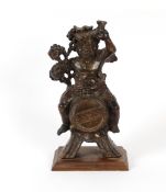 An antique carved wood gesso and lacquered figure