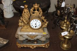 A French style gilded figural decorated mantel clo