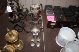 A silver plated four piece tea set and four souven