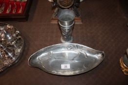 An Art Nouveau shaped dish with stylised decoratio