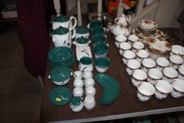 A collection of Denby Green wheat patterned tea wa