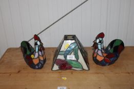 Two Tiffany style table lamps in the form of chick