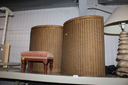 Two loom storage baskets and an upholstered foot s