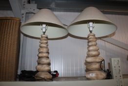 Two pebble style table lamps and shades