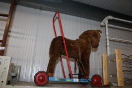 A Merrythought toys push along horse