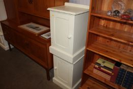 A pair of painted pine bedside cupboards