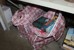 Two bags containing various puzzles and games sold
