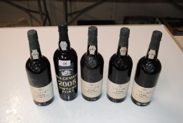 Four bottles of Taylor's 1985 vintage Port and a bottle of Real Cia.Velha 2005 vintage Port