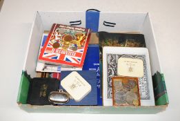 A box of various coinage to include two 1967 Gibraltar £1s, a sovereign case commemorative coin