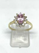 Pink stone and cubic zirconia cluster ring 9ct gold, overall weight 2.