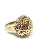 Dress ring, pierced globe design diameter 20mm, marks indistinct believed 14ct, overall weight 6.