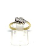 Vintage diamond three stone cross over ring stamped 18ct, overall weight 2.