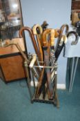 Brass Stick Stand Containing Walking Stick and Umbrellas
