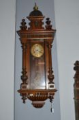 Vienna Wall Clock with Brass Face and Carved & Turned Detail